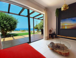 Seafront apartment with private garden